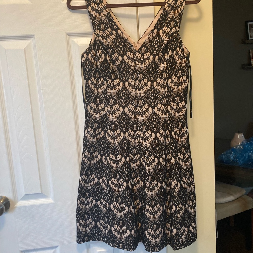 Dressy dress. Light taupe with black net/Lacey over lay. Size 8